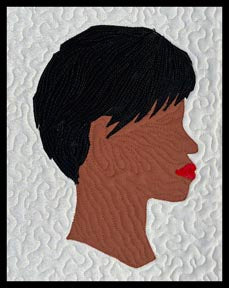 chic medium brown woman with pixie cut